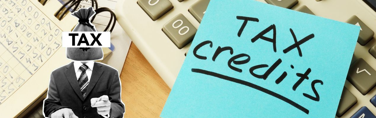 A calculator, tax documents, and a note reading "Tax Credits," representing potential tax benefits and deductions for portable power stations in Australia.