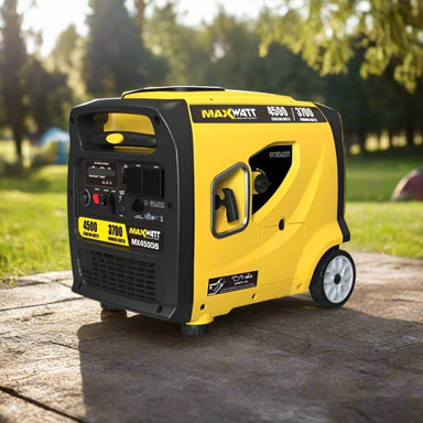 Maxwatt MX4500iS yellow inverter generator side angle on the pavement.