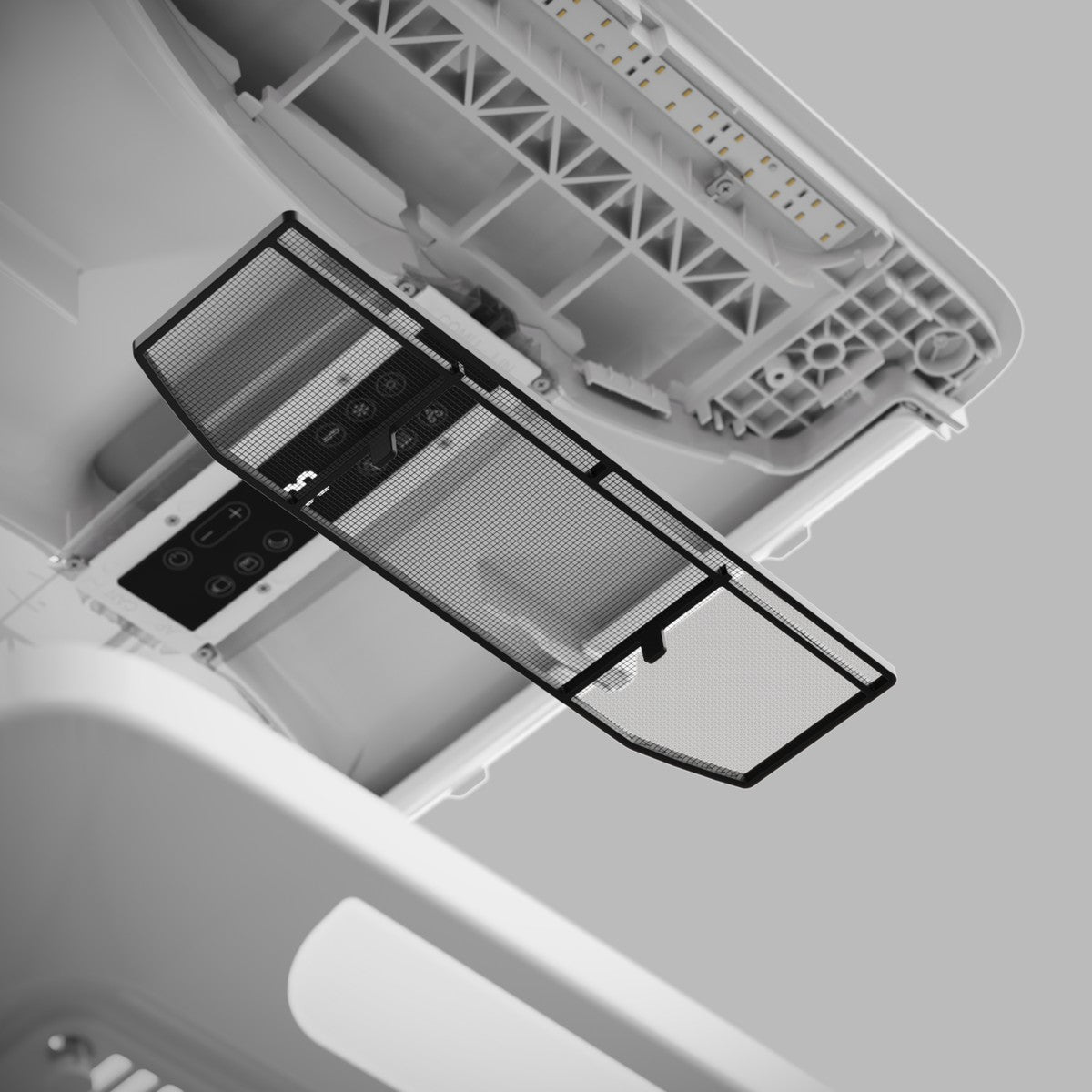 Mini ADB with the filter frame swung down to show the internals