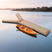 Harbour Y 8.5 Grain Y-shaped dock on a calm lake at dawn with an orange kayak tied alongside the stem
