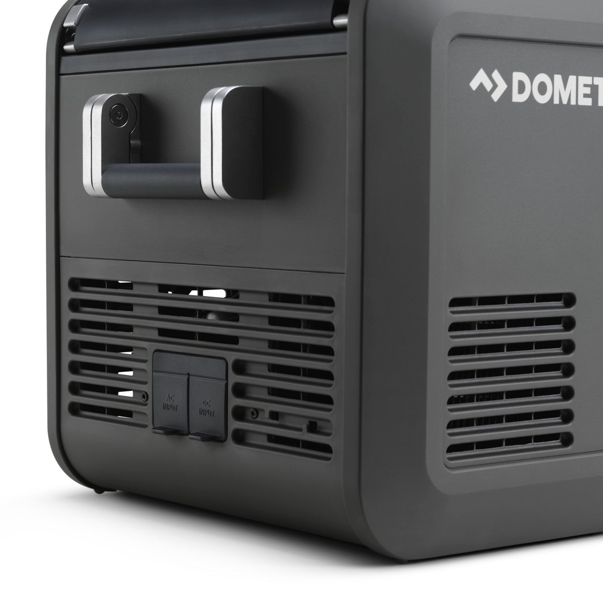 Rear corner of the Dometic CFX5 35 showing the ventilation grille and the 12 volt and mains sockets