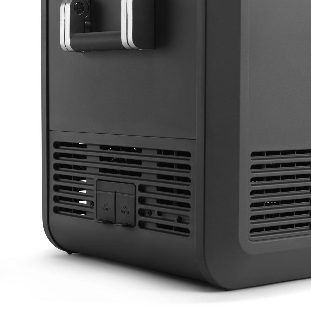 Rear corner of the Dometic CFX5 45 showing the compressor ventilation grille and the 12 volt and mains sockets