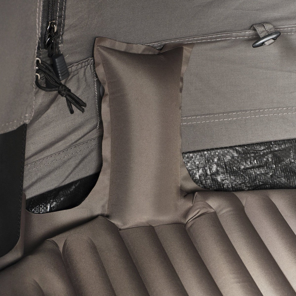 Inside the Pico swag showing the mattress and camouflage storage pocket