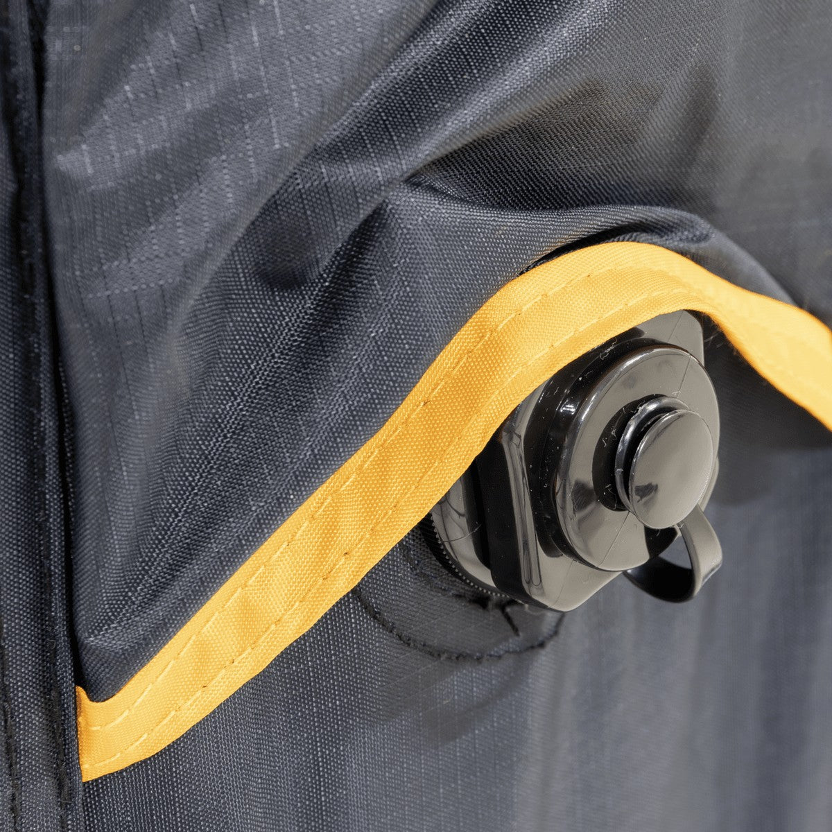Close-up of the yellow-trimmed inflation valve on the Reunion FTG 5x5