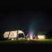 Santorini FTK 2x4 lit from inside at night with a group around the campfire
