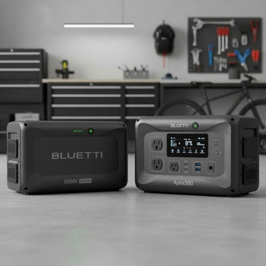 Dark grey portable generators compatible with each other lying on the ground.