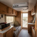 Cool-J Super Quiet 48VDC Inverter Rooftop Air Conditioner installed inside a caravan.