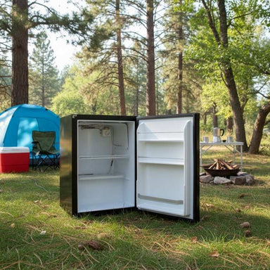 Small fridge placed outside camps in a campsite.