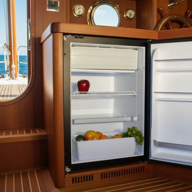 Compact fridge packed with some fruits inside a boat