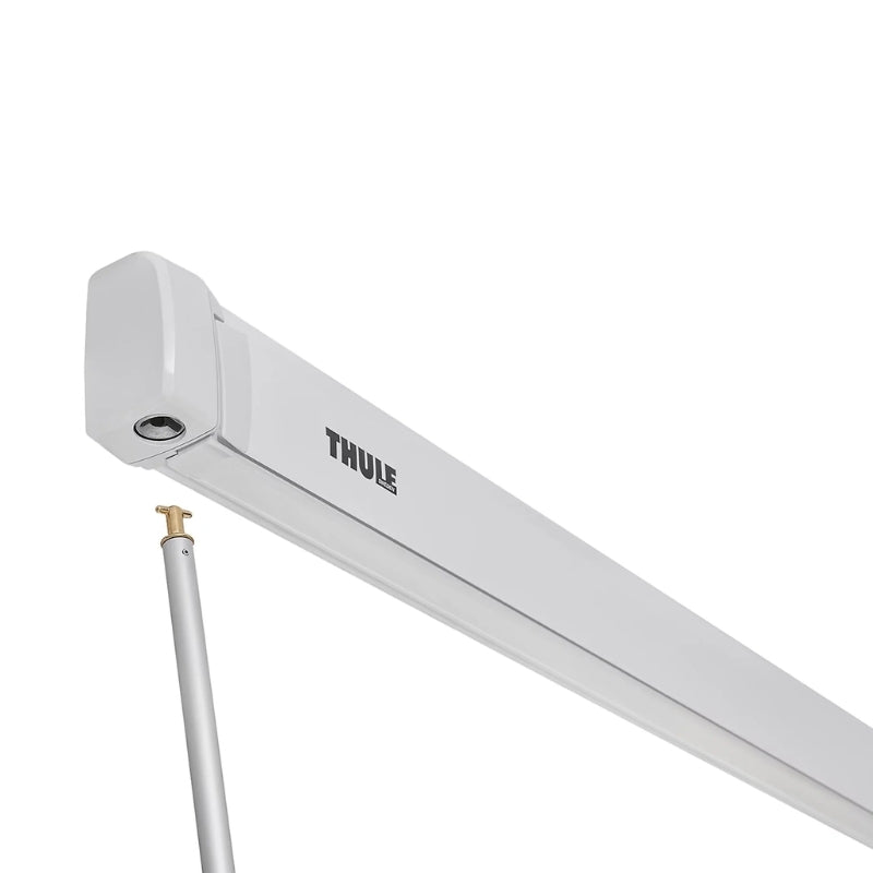 Thule 4200 Awning Manual Cassette in white with awning extended and support legs deployed.