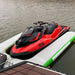 AquaDeck Inflatable Single Jetski Dock with red jetski secured on water-ready dock