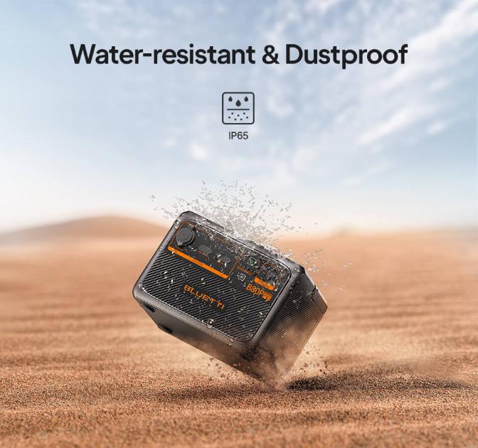 Bluetti B80P battery splashing in sand to show IP65 water and dust resistance