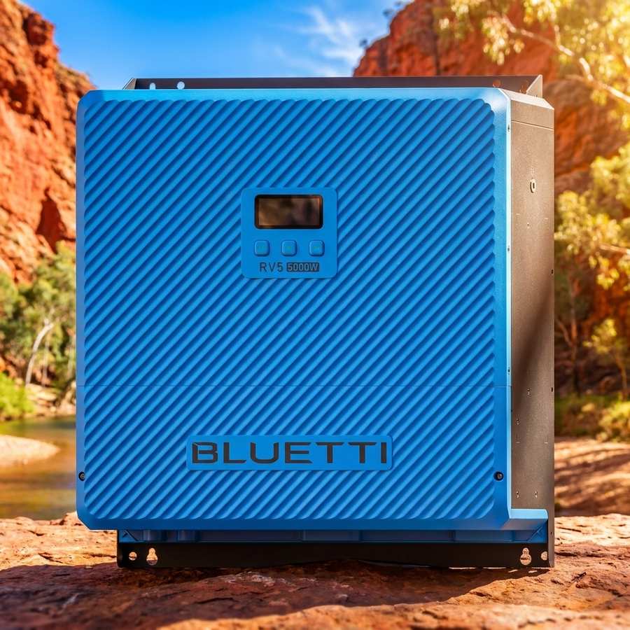 Bluetti RV5 power hub in a red rock gorge with terracotta cliff walls rising behind it