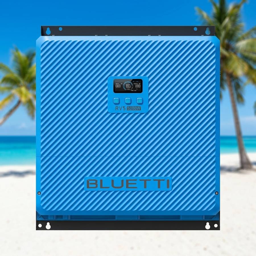 Bluetti RV5 power hub on white sand with turquoise water and palm trees behind it on a tropical Queensland beach