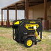 Champion 12500W portable generator running reliably in outdoor farm field barn setting