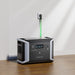 Dabbsson DBS2300 portable power station plugged into wall outlet with visualised green charging indicator