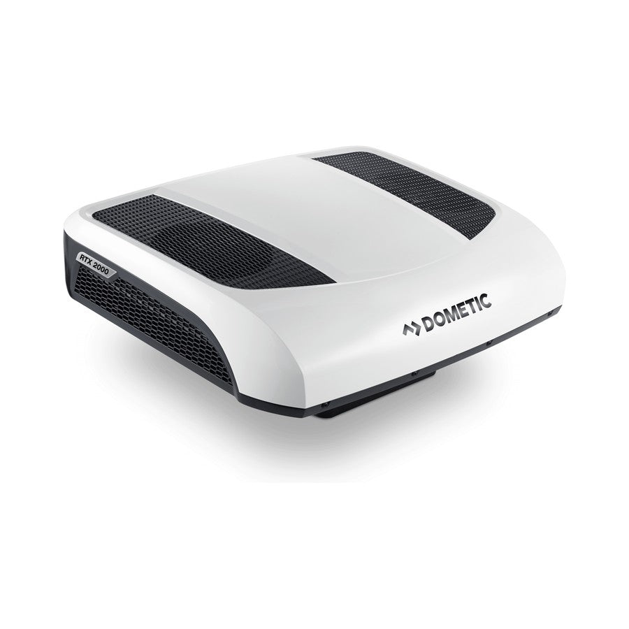 Dometic CoolAir RTX 2000 truck parking cooler at a three-quarter angle showing the white shell and twin black intake grilles