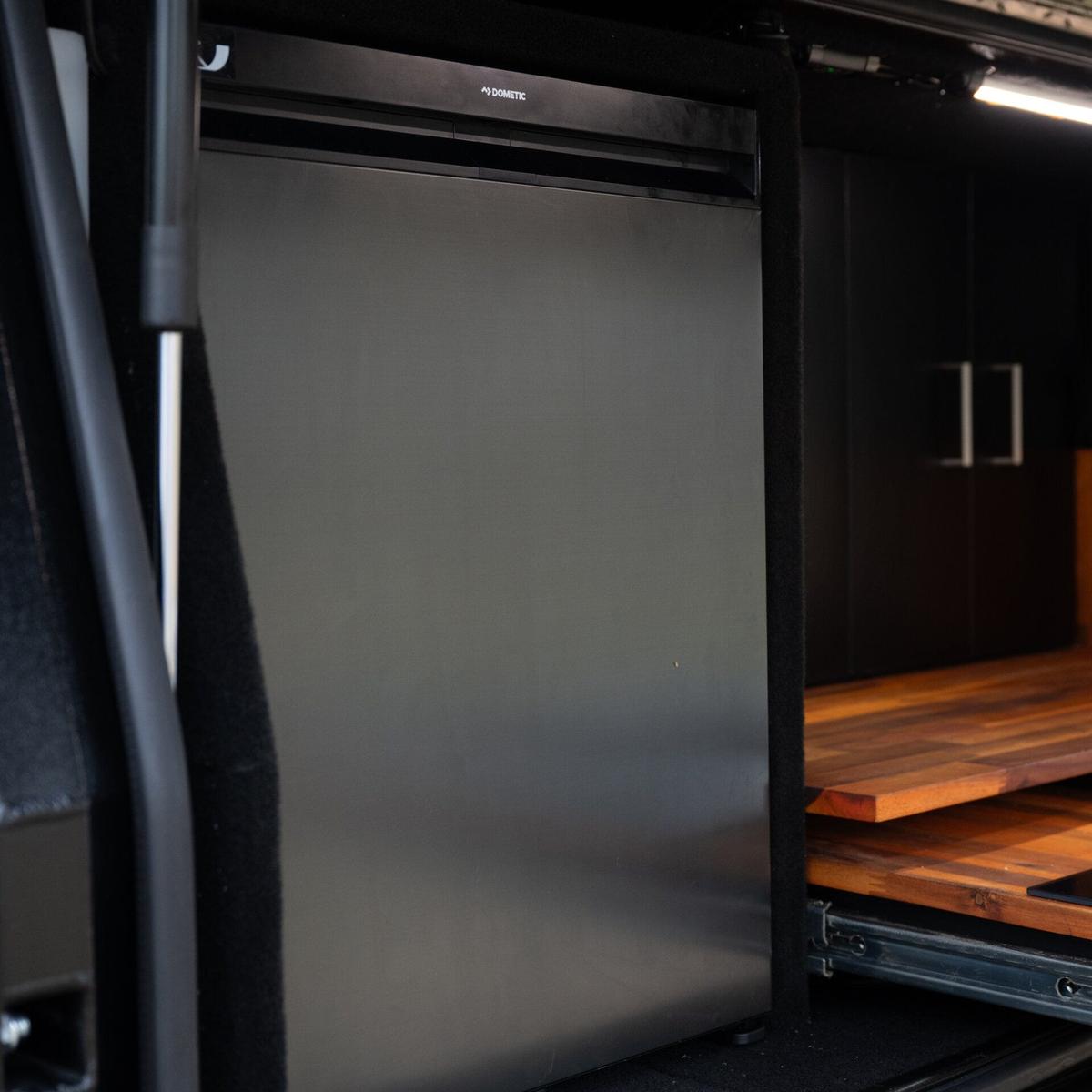 Dometic NRX 80C fridge and slide-out drawers inside a dark 4WD canopy