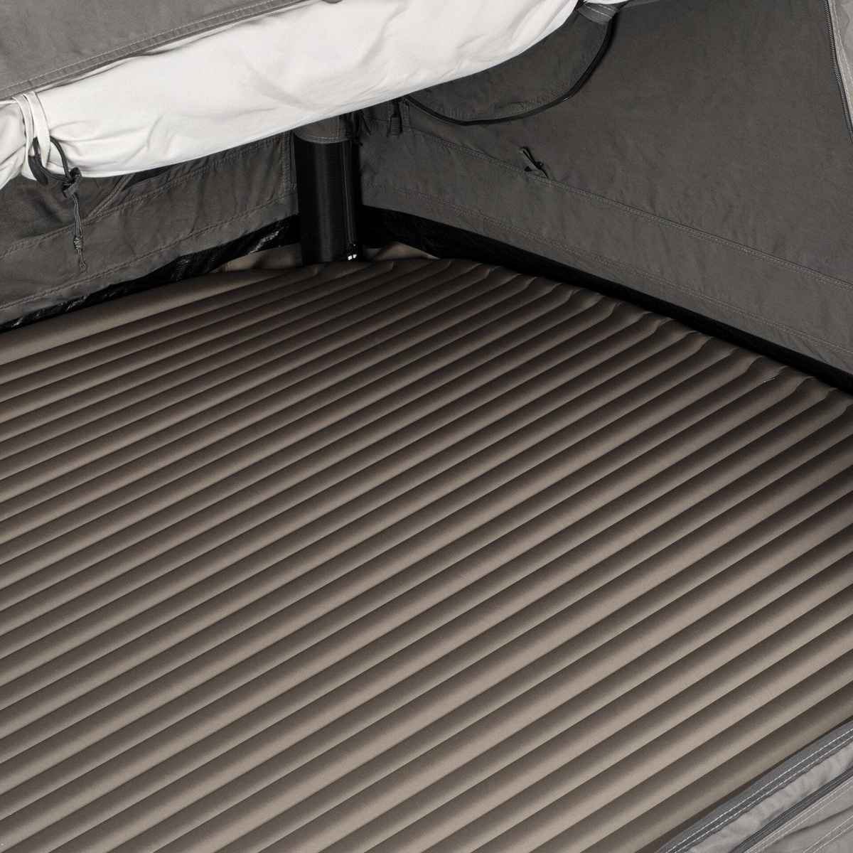 Inside the Dometic Pico FTC 2x2 TC-I looking across the ribbed 45mm I-beam inflatable mattress