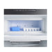 Lit freezer box inside the Dometic RM 2350 holding a blue container and ice trays