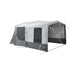 Side view of the Santorini FTK canopy closed in with the sidewall kit and guy lines pegged out