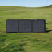 EcoFlow 160W solar panel flat on grass field.