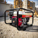 Gentech EP2800HSR Honda generator with compact frame on construction site, side angle view