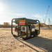 Gentech 8 kVA Honda generator EP8000HSRE-R/S V2 powering construction site in daylight.