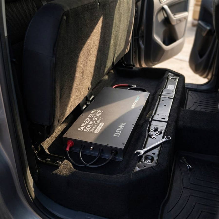 Renogy 104Ah Super Slimline battery fitted flat into a dual-cab ute's underseat cavity