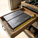 Two Renogy 104Ah Super Slimline batteries lying flat side by side in a canopy drawer tray