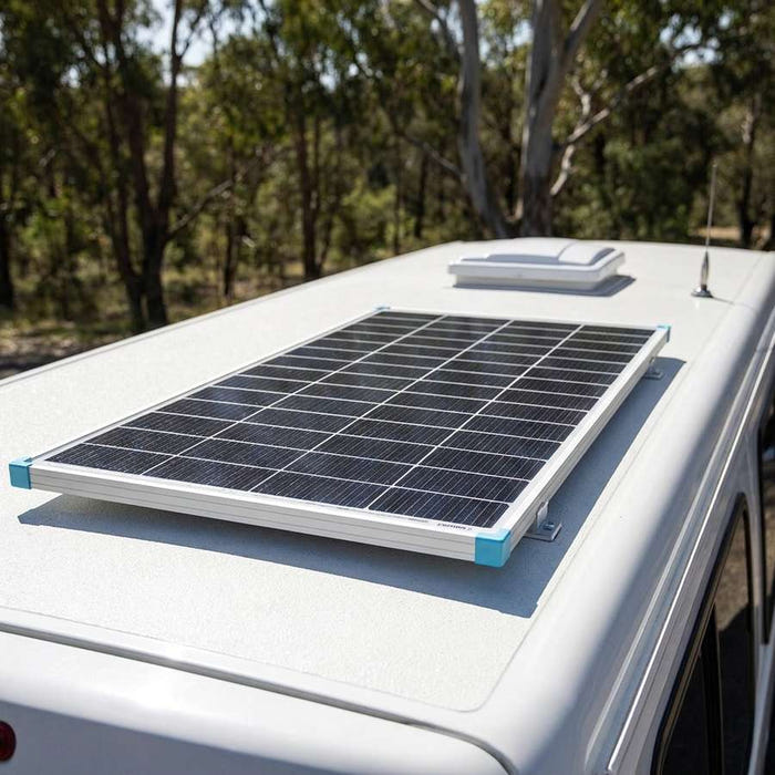 Renogy 175W N-Type solar panel mounted flat on a Class B campervan roof, elevated 3/4 angle