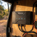 Renogy IP67 50A DC-DC charger mounted in a 4WD canopy electrical bay with cable glands