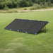 Renogy 300W N-Type suitcase solar panel with kickstand setup on grassy field outdoors