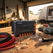 PMS1260 on a shed workbench mid fitout with a cordless driver and cable offcuts nearby