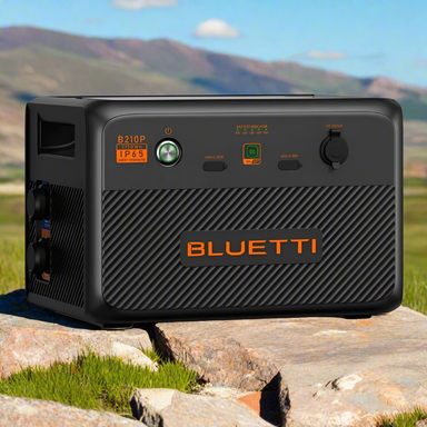 Bluetti B210P on a rock with a mountainous landscape in the background