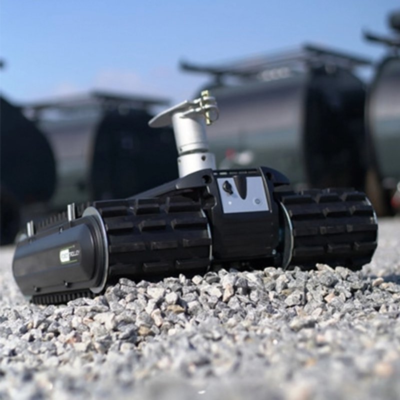 Robot Trolley 1500RS G5 Caravan Mover with black tracks placed on gravel surface