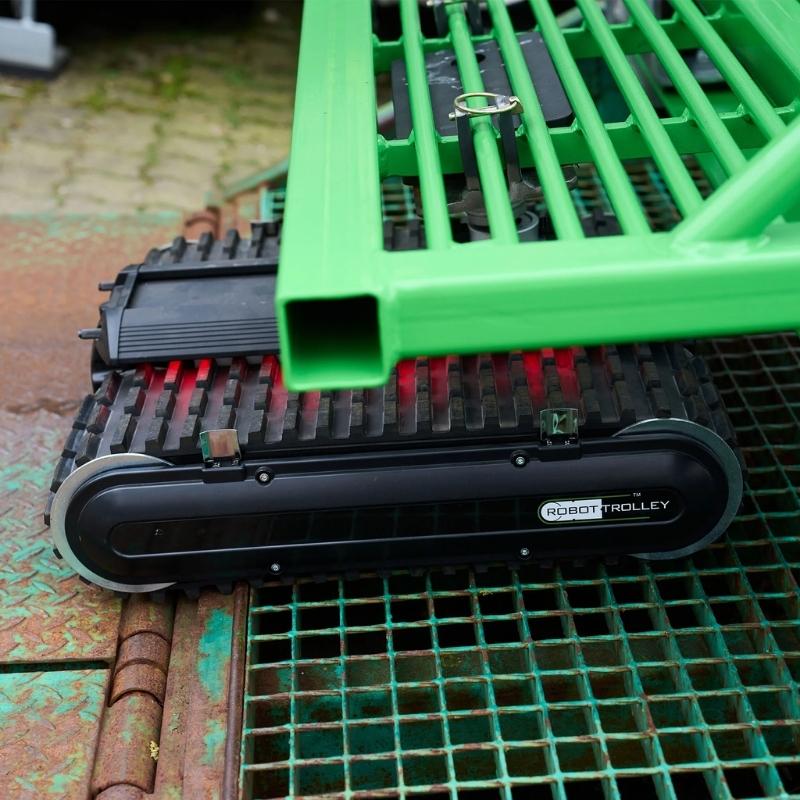 Robot Trolley 4500 G3 in action, towing a large frame with a sturdy track system.