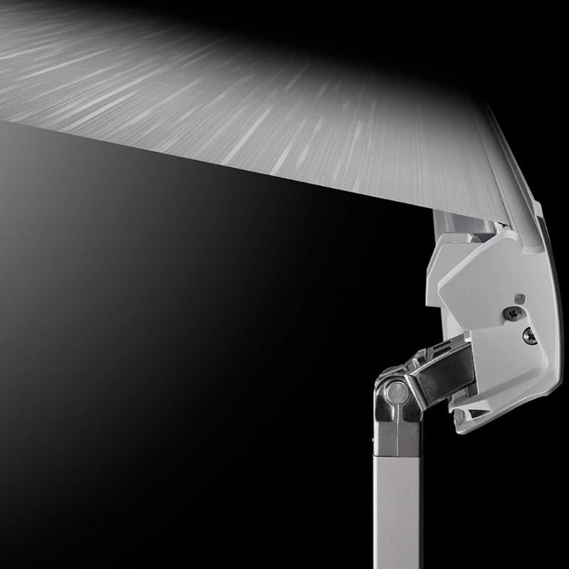 Side-angle view of the Thule Omnistor 5200 Electric 12V awning cassette, designed for easy deployment and space-saving.