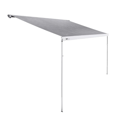 Thule Omnistor 6300 Electric 12V Awning fully extended, offering a spacious shaded area for relaxing or dining in nature.