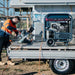 Welling & Crossley 13.75KVA RCD generator powering jobsite tools