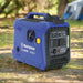 Westinghouse iGen2250 inverter generator right side angle on campsite with tents in background